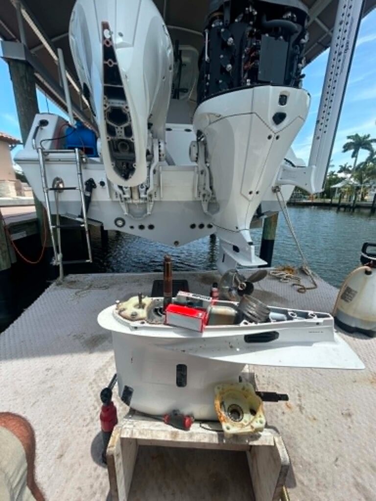 Lower unit removed from a twin Yamaha 300 outboard for gear case service in Cape Coral