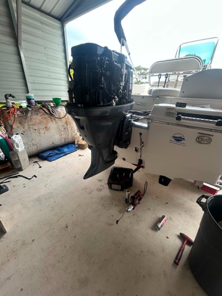Yamaha 115 outboard getting a full service from a mobile marine mechanic in Fort Myers
